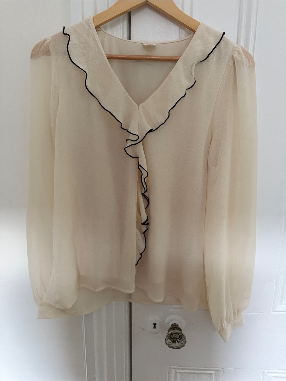 Cream Ruffle V-Neck Blouse with Black Trim